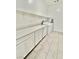 Laundry room including counter space, storage cabinets and a modern washer and dryer at 7041 Fossil Rim St, North Las Vegas, NV 89084