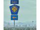 Clark County 215 East sign with Las Vegas skyline in the background at 7041 Fossil Rim St, North Las Vegas, NV 89084