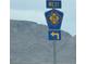 Clark County 215 West sign with mountains in the background at 7041 Fossil Rim St, North Las Vegas, NV 89084