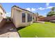 Backyard featuring low-maintenance turf at 7441 Aurora Glow St, Las Vegas, NV 89139