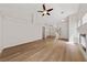 Bright living room with ceiling fan and fireplace at 7441 Aurora Glow St, Las Vegas, NV 89139