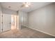 Bright bedroom features soft carpet, neutral walls, and mirrored closet doors at 7716 Twin Tails St, Las Vegas, NV 89149