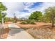Enjoy the community's walking paths for a relaxing stroll amid desert landscaping and open space at 7716 Twin Tails St, Las Vegas, NV 89149