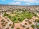 Scenic view of a community park with open green spaces, walking paths, and recreational facilities at 7716 Twin Tails St, Las Vegas, NV 89149
