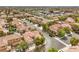 Charming neighborhood street view with well-maintained homes and mature landscaping at 7716 Twin Tails St, Las Vegas, NV 89149