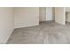 Bedroom with neutral walls, gray carpet and closet with sliding door at 7808 Brook Valley Dr, Las Vegas, NV 89123