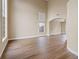 Spacious living room with high ceilings and wood floors, bathed in natural light at 7808 Brook Valley Dr, Las Vegas, NV 89123