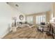 Neutral living room featuring plantation shutters and a fireplace for a cozy, classic look at 805 Blue Springs Dr, Henderson, NV 89002