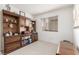 Office with wooden built-ins and natural light streaming through the window at 805 Blue Springs Dr, Henderson, NV 89002
