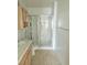 Bathroom featuring tile flooring and glass-enclosed shower at 8452 Boseck Dr # 216, Las Vegas, NV 89145