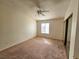 Neutral bedroom with ceiling fan and good light at 8452 Boseck Dr # 216, Las Vegas, NV 89145