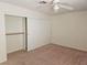 Bedroom with ceiling fan and built-in closet at 8452 Boseck Dr # 216, Las Vegas, NV 89145
