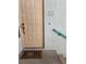 Front door to home, with visible unit number, doormat and blue handrail at 8452 Boseck Dr # 216, Las Vegas, NV 89145