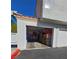 Spacious two car garage filled with personal belongings and household items at 8452 Boseck Dr # 216, Las Vegas, NV 89145