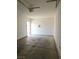 Clean single car garage interior with an overhead light, fire extinguisher, and door at 8452 Boseck Dr # 216, Las Vegas, NV 89145