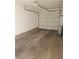Uncluttered single car garage with opener and a multi-paneled door design at 8452 Boseck Dr # 216, Las Vegas, NV 89145