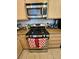 Kitchen with stainless steel appliances including a gas range and microwave at 8452 Boseck Dr # 216, Las Vegas, NV 89145