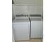 A compact laundry area features a side-by-side washer and dryer set at 8452 Boseck Dr # 216, Las Vegas, NV 89145
