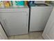 Laundry area with a white washer and dryer set, ready for your convenience at 8452 Boseck Dr # 216, Las Vegas, NV 89145