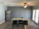 Spacious dining room with stainless steel refrigerator at 904 Rockaway St, Las Vegas, NV 89145