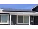 Close-up of the solar panels and front windows of the charming home at 904 Rockaway St, Las Vegas, NV 89145