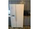 Close-up of the kitchen refrigerator and cabinets at 904 Rockaway St, Las Vegas, NV 89145