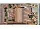 Aerial view of backyard with ornate landscaping, fountain, and home featuring a tile roof at 931 Temple View Dr, Las Vegas, NV 89110