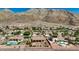 Gorgeous home featuring a backyard oasis with pool, fire pit, and Mountain View at 931 Temple View Dr, Las Vegas, NV 89110
