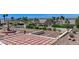 Landscaped backyard boasts a fountain, planters, and a view of the Las Vegas skyline at 931 Temple View Dr, Las Vegas, NV 89110