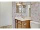 Small bathroom featuring a vanity, mirror, and toilet at 931 Temple View Dr, Las Vegas, NV 89110