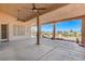 Wonderful covered patio with a serene backyard view, ready for relaxation and enjoyment at 931 Temple View Dr, Las Vegas, NV 89110