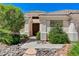 Inviting front entrance featuring desert landscaping and a stone walkway at 931 Temple View Dr, Las Vegas, NV 89110