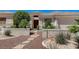 Inviting front entrance featuring desert landscaping and a stone walkway at 931 Temple View Dr, Las Vegas, NV 89110