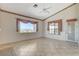 Light-filled living area showcasing tiled floors and views of the surrounding community at 931 Temple View Dr, Las Vegas, NV 89110