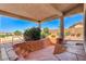 Secluded backyard spa with a built-in rock design and a covered patio in the background at 931 Temple View Dr, Las Vegas, NV 89110