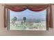 Window view framing the city skyline, offering a picturesque and serene backdrop at 931 Temple View Dr, Las Vegas, NV 89110