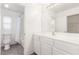 Bright bathroom featuring toilet, tiled flooring, and vanity with sink at 9339 Bondeno St, Las Vegas, NV 89123