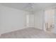 Bright bedroom featuring plush carpeting and ensuite bathroom entrance at 9339 Bondeno St, Las Vegas, NV 89123