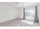 A bright and airy bedroom is accentuated by natural light with a ceiling fan at 9339 Bondeno St, Las Vegas, NV 89123
