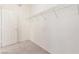 Walk-in closet featuring carpeted floors and wire shelving, great for storage at 9339 Bondeno St, Las Vegas, NV 89123