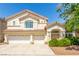 Charming two-story home with a three-car garage and well-manicured landscaping in a suburban neighborhood at 9339 Bondeno St, Las Vegas, NV 89123