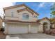 Charming two-story home with a spacious driveway and a well-maintained front yard at 9339 Bondeno St, Las Vegas, NV 89123