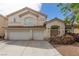 Charming two-story home with a spacious driveway and a well-maintained front yard at 9339 Bondeno St, Las Vegas, NV 89123