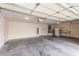 An oversized garage equipped with a door to the outside and a water heater, providing convenience at 9339 Bondeno St, Las Vegas, NV 89123