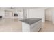 Spacious open-concept kitchen with an island looking into the main living area at 9339 Bondeno St, Las Vegas, NV 89123