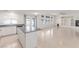 Open concept kitchen and living area with stainless steel appliances at 9339 Bondeno St, Las Vegas, NV 89123
