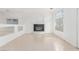 Spacious living area featuring a fireplace, and large windows that let in plenty of light at 9339 Bondeno St, Las Vegas, NV 89123