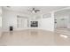 Spacious living room featuring a fireplace, built-in shelves, and open layout at 9339 Bondeno St, Las Vegas, NV 89123