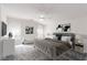 Calm primary bedroom featuring a comfortable bed, ceiling fan, and soft natural light through sheer curtains at 9339 Bondeno St, Las Vegas, NV 89123