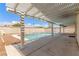 Backyard view featuring a refreshing pool and shaded patio at 9339 Bondeno St, Las Vegas, NV 89123